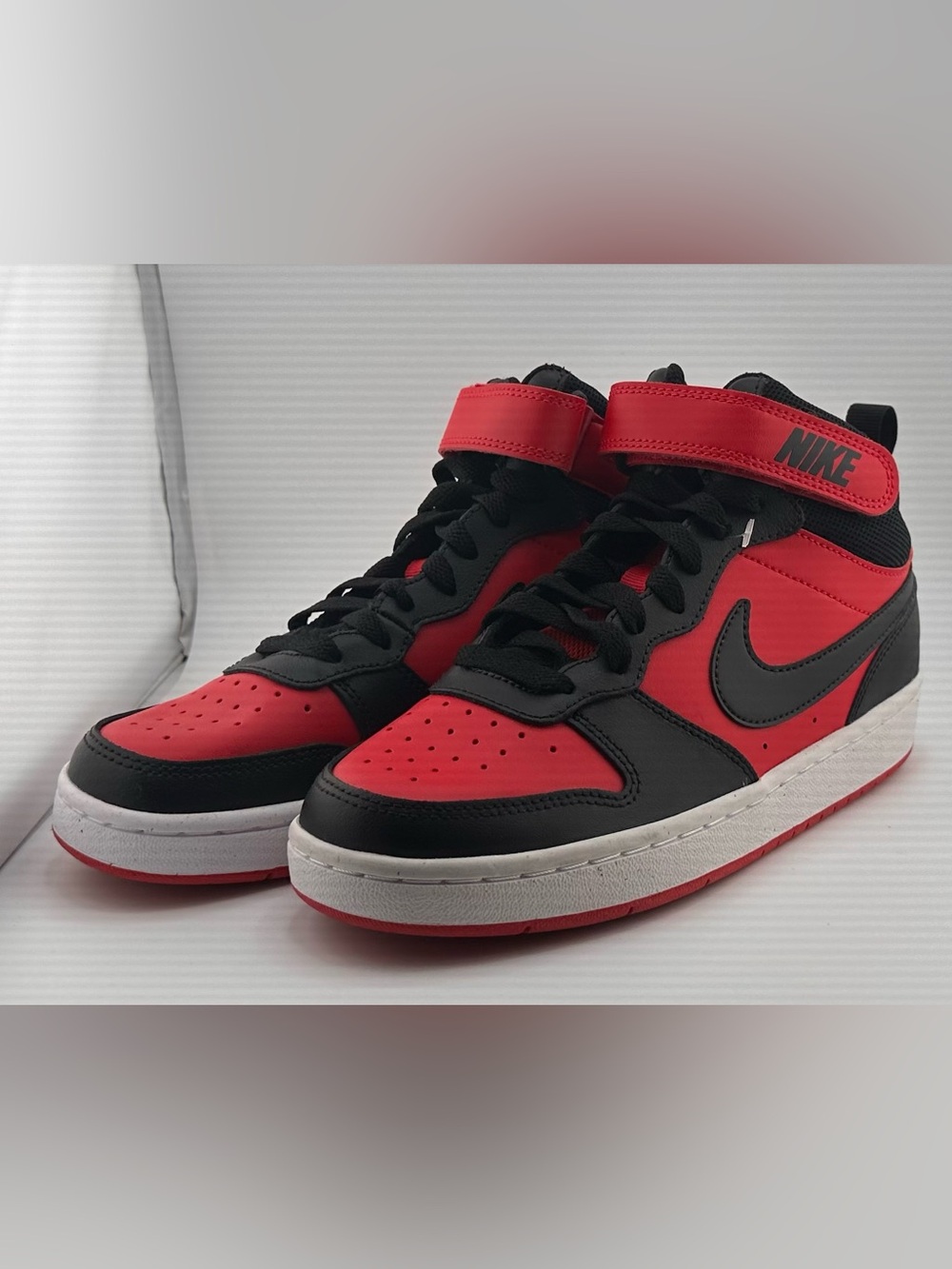 Nike Black and Red Mid-Top Sneakers